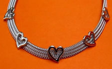 Picture of “Herringbone Heart” set of necklace and bracelet entirely in Italian sterling silver, flat herringbone decorated with polished hearts