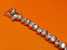 Picture of “Ying Yang Zirconia ” tennis bracelet in sterling silver,  a row of round cubic zirconia connected in ying yang