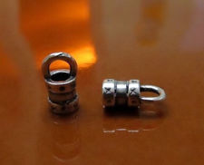 Picture of 11.4x6 mm, crimp cord end caps, hugs and kisses, 4 mm hole, JBB findings, silver-plated pewter, 2 pieces