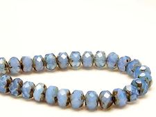 Picture of 6x8 mm, Czech faceted rondelle beads, light opal royal blue, translucent, travertine