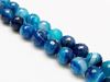 Picture of 10x10 mm, round, gemstone beads, natural striped agate, deep electric blue, faceted