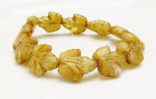 Picture of 16x14 mm, Czech druk beads, maple leaf, flax light gold, matte, bronze patine, 6 pieces