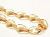 Image de 19x13 mm, perles de verre pressé tchèque, feuille torsadée, transparentes, lustrées beige champagne, 12 pièces