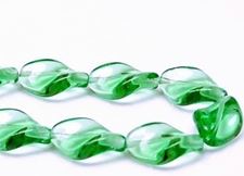 Picture of 19x13 mm, Czech druk beads, twisted leaf, emerald green, transparent, 12 pieces
