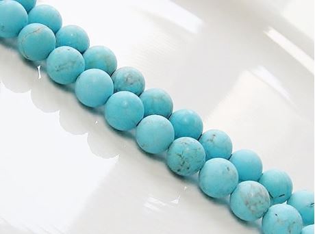 Picture of 8x8 mm, round, gemstone beads, magnesite, turquoise blue, frosted
