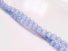 Picture of 4x4 mm, round, gemstone beads, cat's eye, tropical indigo blue, one strand
