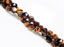 Picture of 5x6 mm, round English cut, gemstone beads, tiger eye, golden-brown, natural, faceted