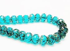 Picture of 7x10 mm, carved cruller beads, Czech, zircon blue, transparent, picasso