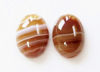 Picture of 13x18 mm, oval, gemstone cabochons, natural striped agate, milk chocolate brown
