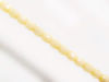 Picture of 3x3 mm, Czech faceted round beads, chalk white, opaque, cream butter white shimmer