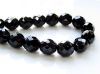 Picture of 12x12 mm, Czech faceted round beads, jet black, opaque, pre-strung, 1 bead