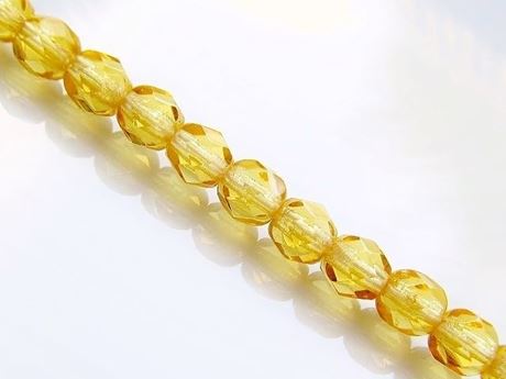 Picture of 4x4 mm, Czech faceted round beads, honey yellow, transparent, pre-strung