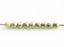 Picture of 2x2 mm, Czech beads,  a soup of different round shapes, limelight or light yellow-green, opaque, saturated metallic