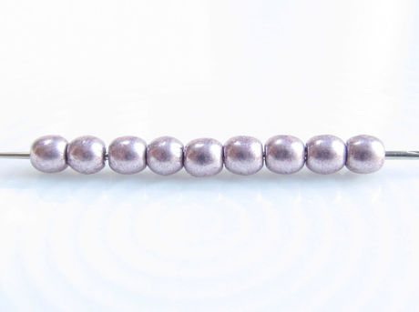Picture of 2x2 mm, round, Czech druk beads, blackened pearl or silvery purple, opaque, sueded gold