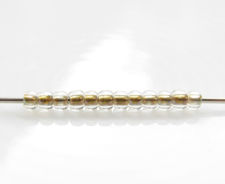 Picture of Japanese seed beads, round, size 11/0, Toho, transparent, gold-lined crystal
