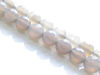 Picture of 6x6 mm, round, gemstone beads, agate, light warm grey or light greige, faceted, natural