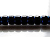 Picture of Czech seed beads, size 8, opaque, jet black, full AB-lined